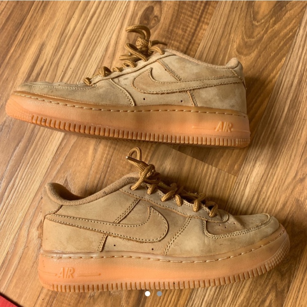 Women’s Nike Air Force ones in the color wheat